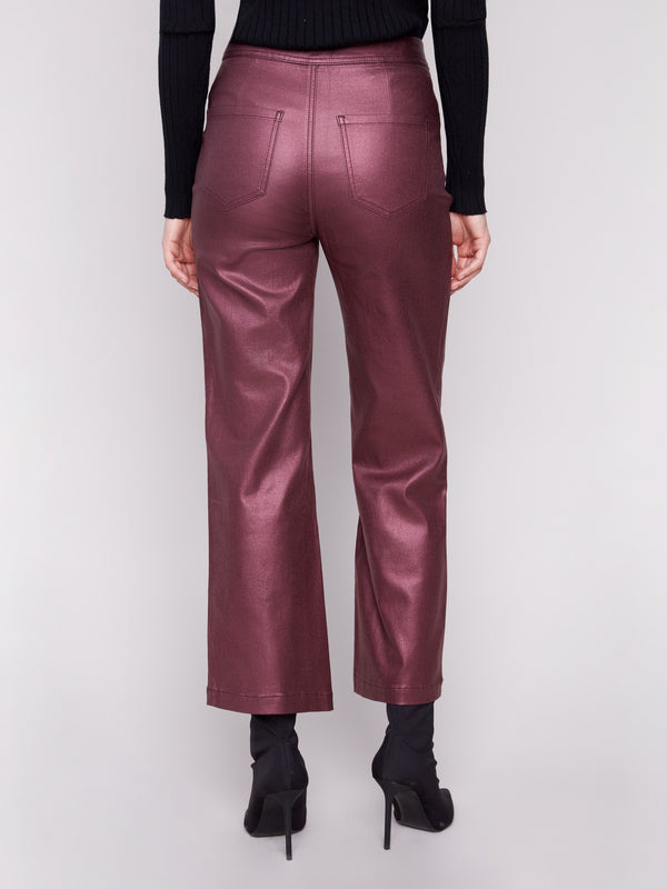 The cropped length of these cabernet flared pants adds an edgy touch to any outfit by Charlie B.