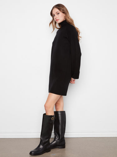 Stylish black mini sweater dress with cozy long raglan sleeves for comfort and elegance by Charlie B.