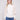 Ecru sweater featuring a sophisticated mock neck design, perfect for elevating any wardrobe with its chic style by Charlie B.