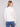 Elegant ecru sweater showcasing ribbed cuffs for a comfortable and snug fit, ideal for cool weather wear by Charlie B.
