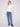 Chic ecru sweater with intricate crochet detailing on the sleeves, offering a unique and fashionable look by Charlie B.