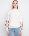 Sweater with a mock neckline and delicate floral embroidery on the sleeves, offering a charming touch to any outfit by Charlie B.