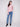 Elegant primrose sweater with fancy buttons at the neck, offering a touch of sophistication by Charlie B.