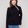 Elegant black sweater featuring a mock neck design with stylish crochet accents by Charlie B.