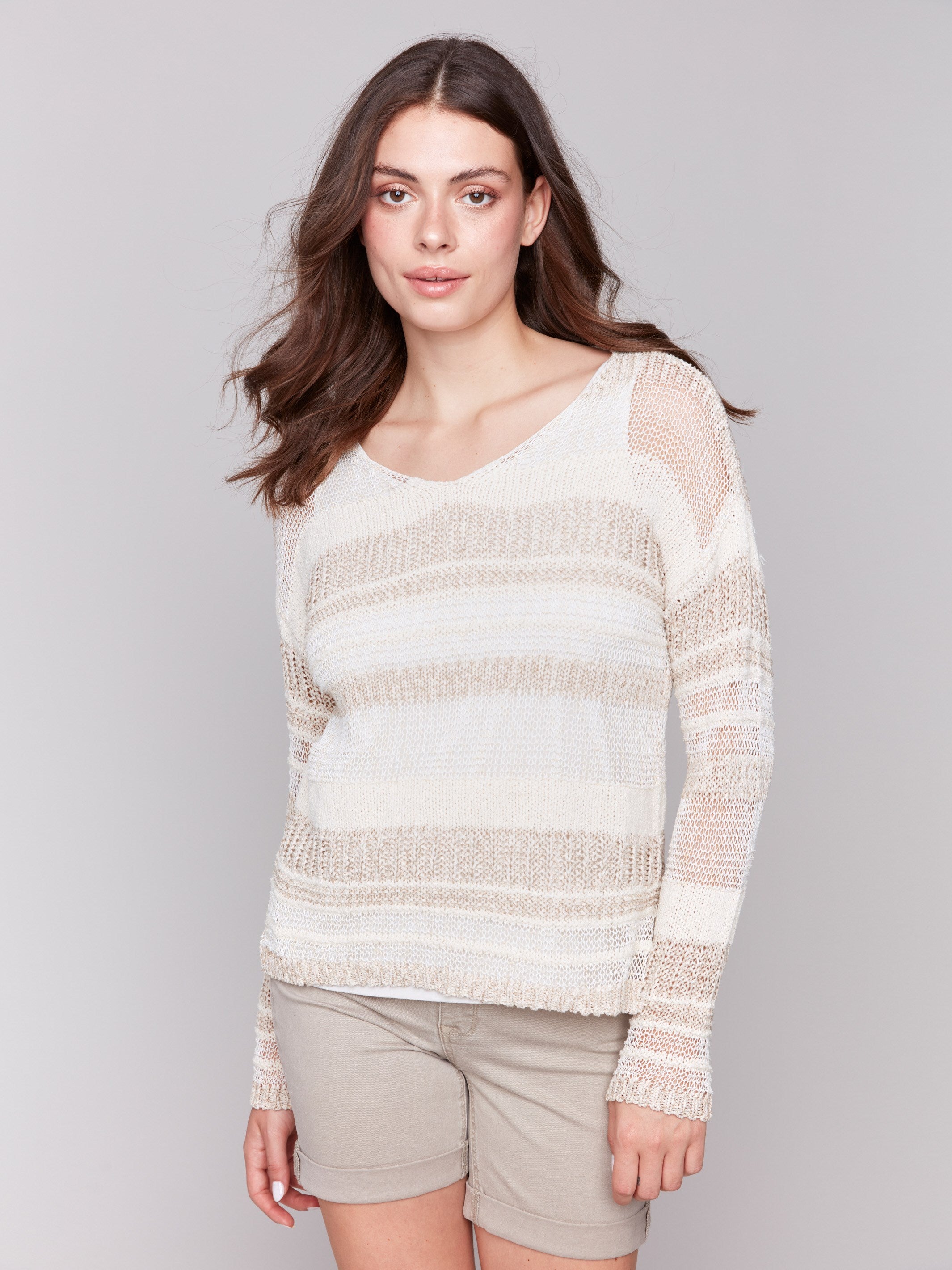 Striped sweater featuring a rounded V-neck, perfect for casual outings by Charlie B.