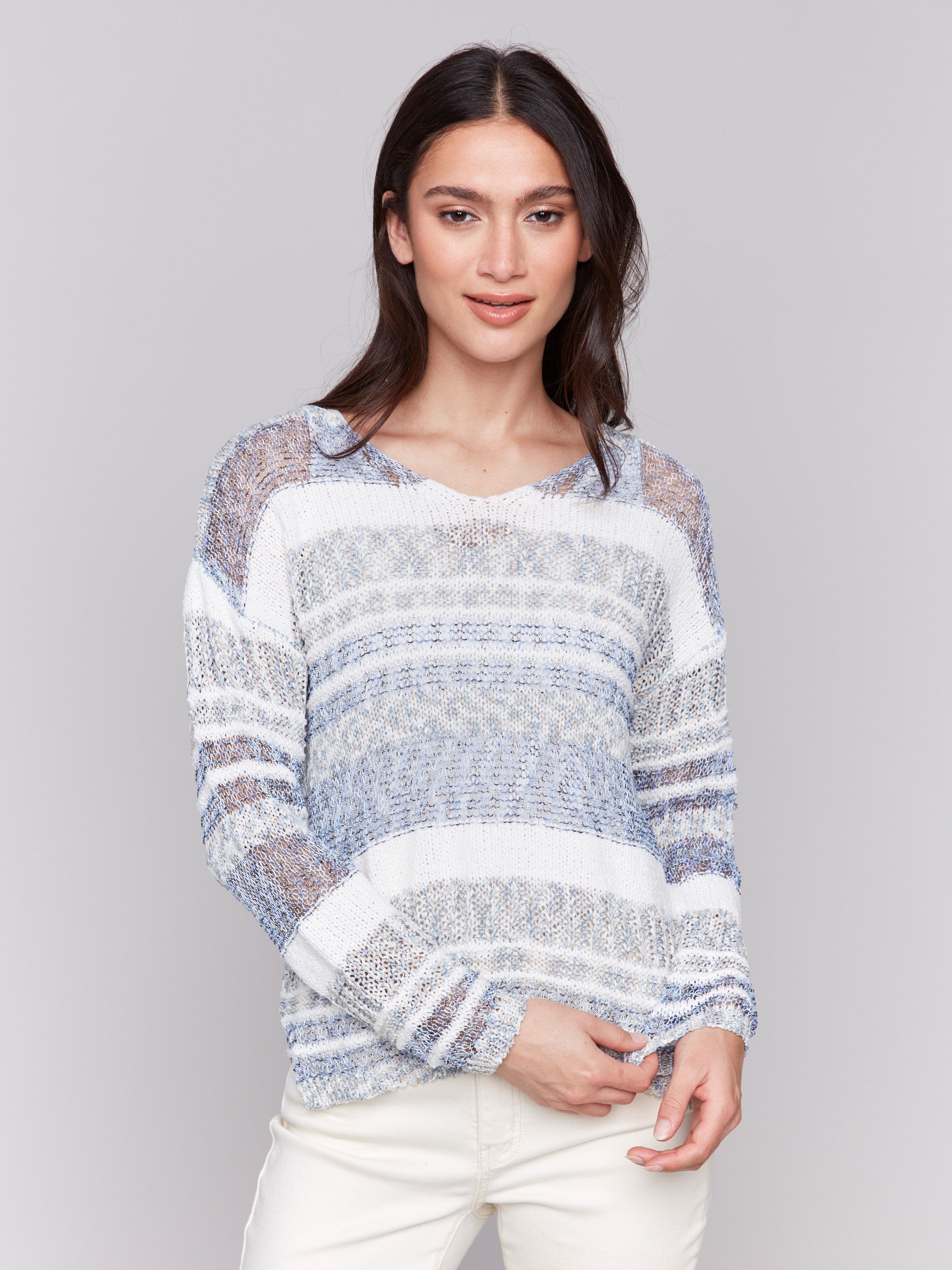 Denim sweater with a rounded V-neck and stylish design by Charlie B.