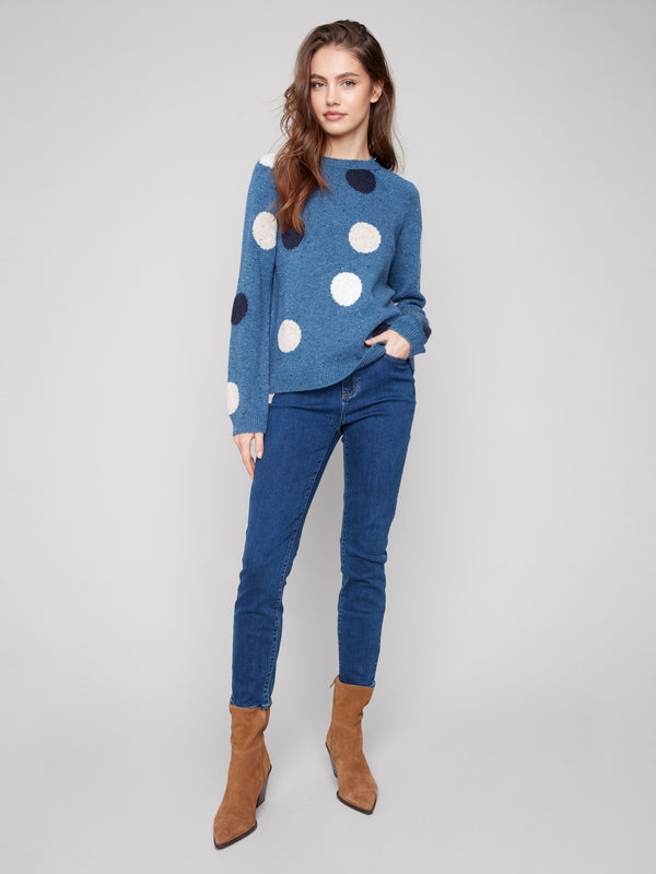 Flecked yarn adds texture to the heather Oxford sweater, complete with a mock neck and bold polka dots by Charlie B.