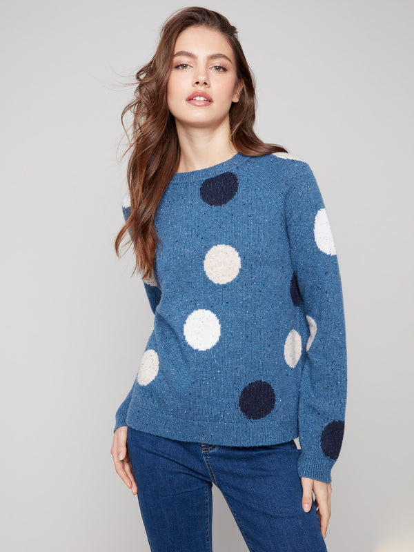 Charming polka dots adorn this heather Oxford sweater, made from textured flecked yarn for added style by Charlie B.