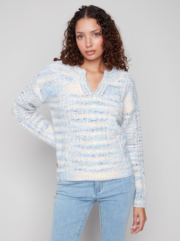 Denim-hued sweater with a notched neckline, crafted from soft eyelash yarn for a cozy feel by Charlie B.