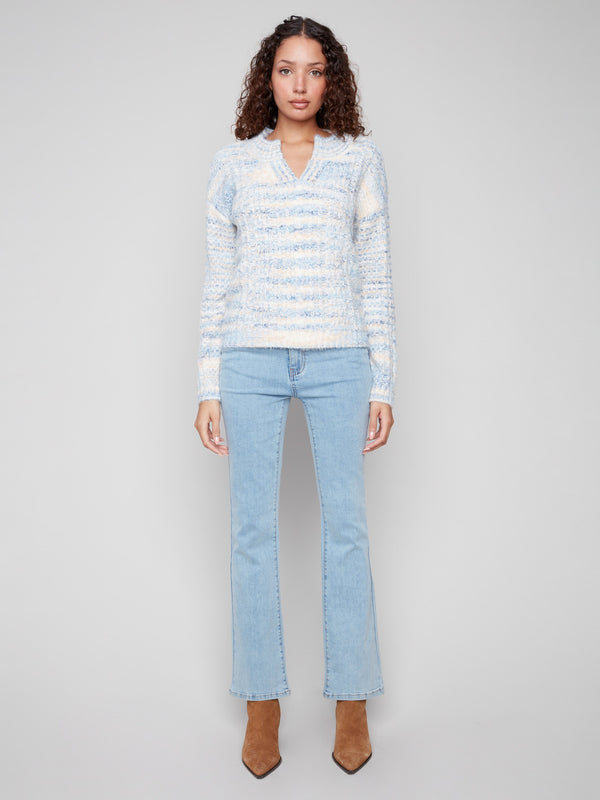 Stylish denim-colored sweater featuring drop shoulder design and striped pattern, ideal for casual wear by Charlie B.