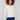 Ecru cable knit sweater with a notched neckline and drop shoulder design, perfect for a cozy look by Charlie B.