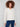 Ecru cable knit sweater with a notched neckline and drop shoulder design, perfect for a cozy look by Charlie B.