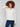 Stylish ecru sweater crafted from soft eyelash yarn material, featuring a unique striped pattern by Charlie B.