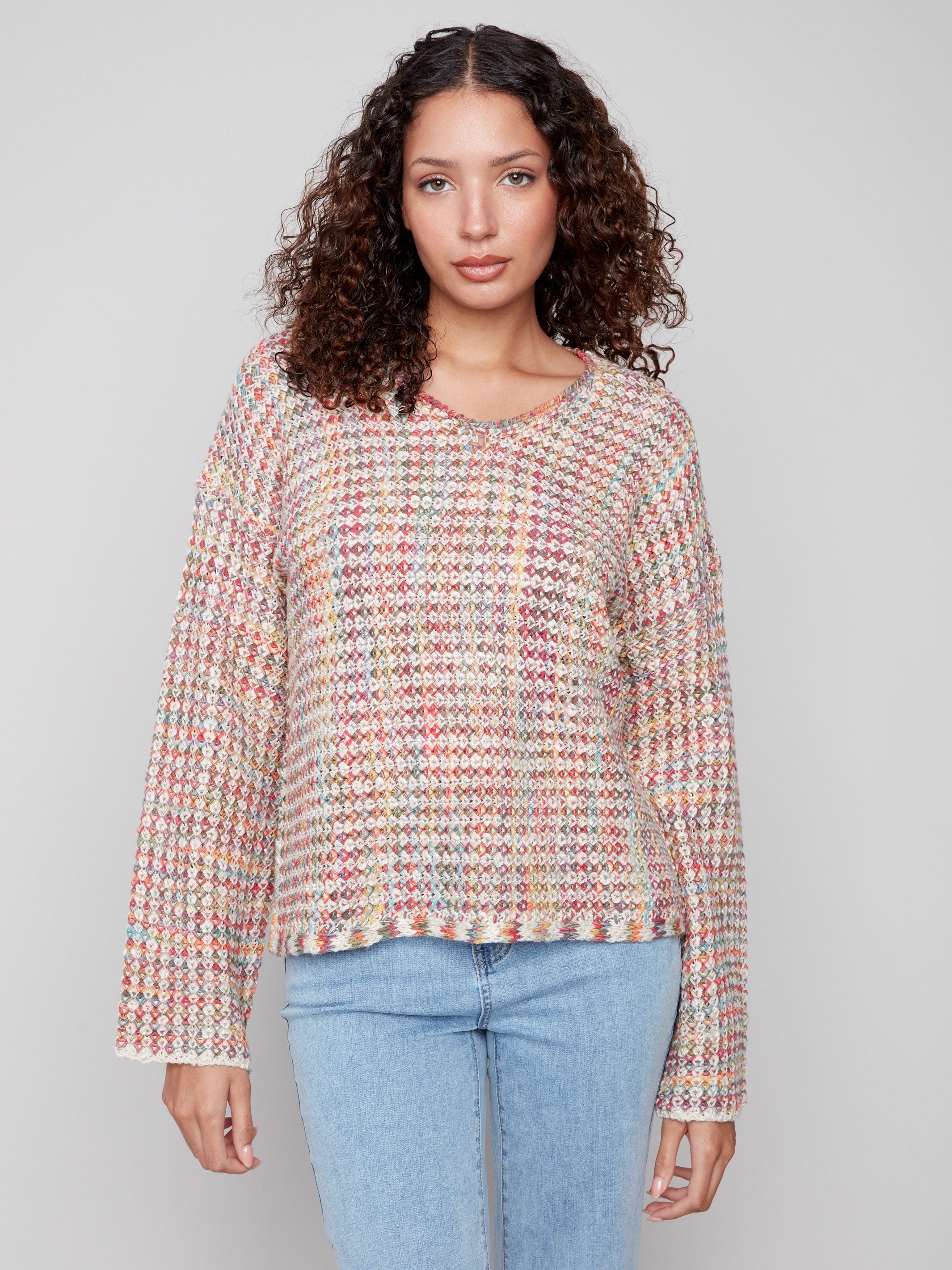 Stylish multicolor crochet sweater crafted with intricate novelty yarn detailing by Charlie B.