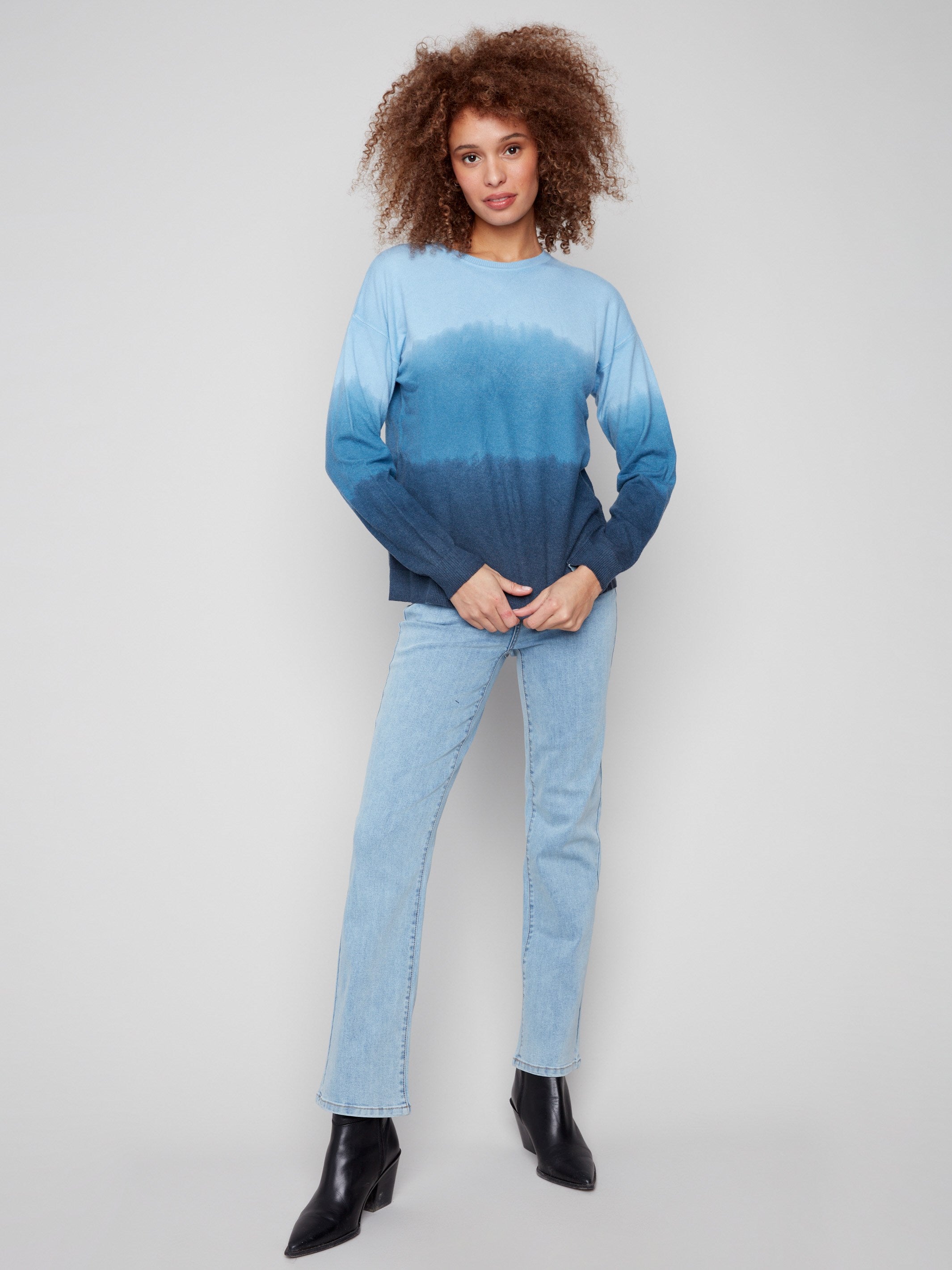 Elegant blue ombre sweater featuring long sleeves and artistic gradient design, perfect for any casual outing by Charlie B.