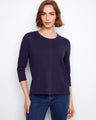 Navy top featuring a crew neckline, perfect for casual outings and layering. The soft fabric ensures comfort all day by Charlie B.