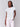 White tee showcasing short sleeves and a chest pocket by Charlie B.