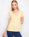 Yellow T-shirt featuring a stylish V-neck, perfect for casual outings. Crafted from lightweight cotton for all-day comfort. By Charlie B.