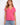Pink T-shirt featuring a flattering V-neck, perfect for casual outings. Ideal for layering or wearing alone. By Charlie B.