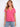 Pink T-shirt featuring a flattering V-neck, perfect for casual outings. Ideal for layering or wearing alone. By Charlie B.