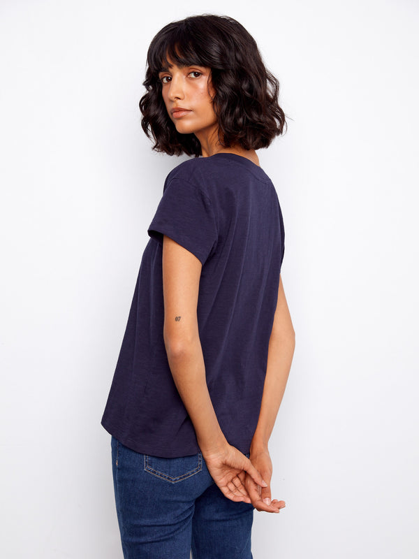 Enjoy the comfort of lightweight cotton in this versatile navy T-shirt with a chic V-neck detail. Fashioned by Charlie B.