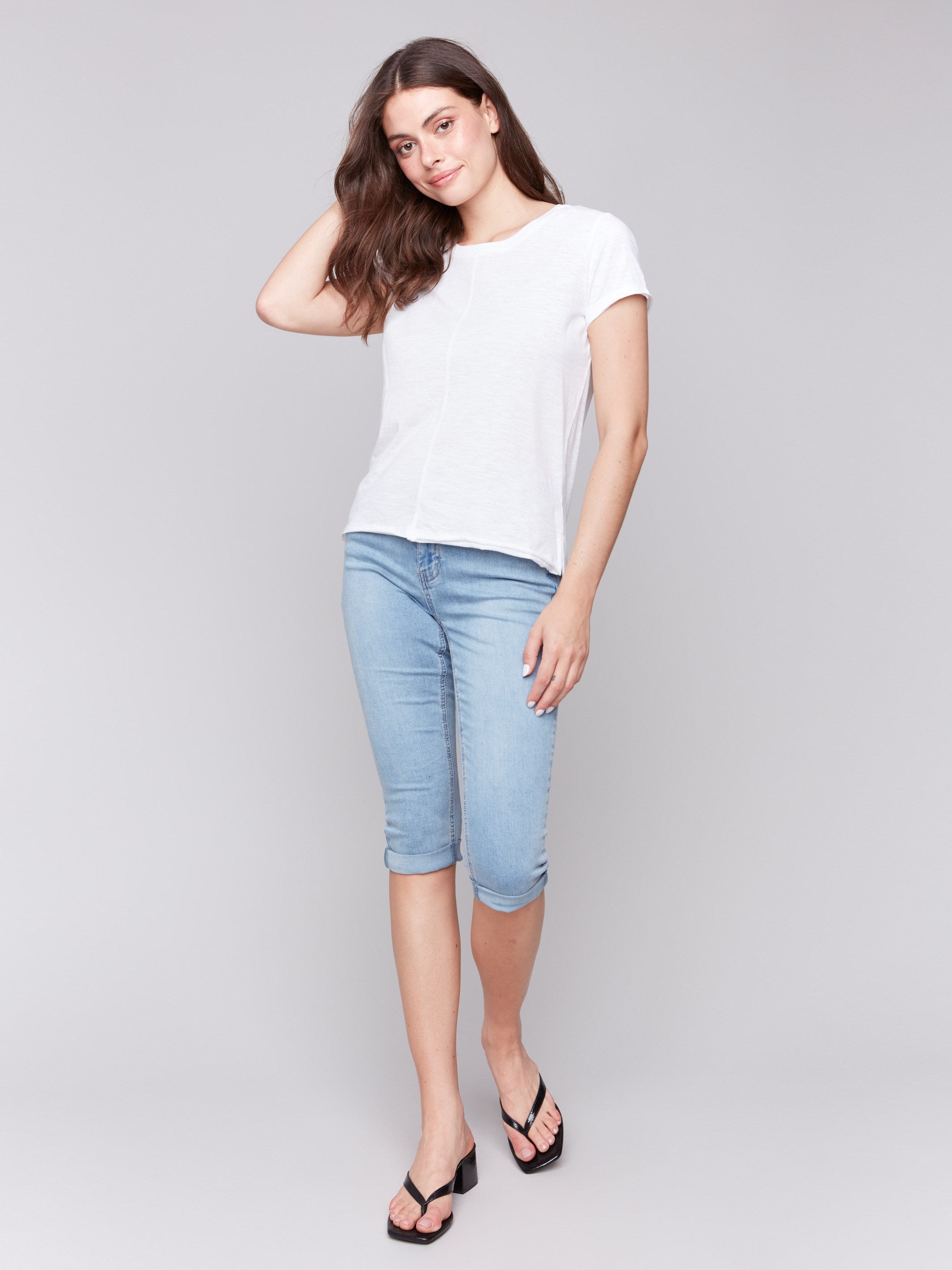 White t-shirt featuring side slits, by Charlie B.