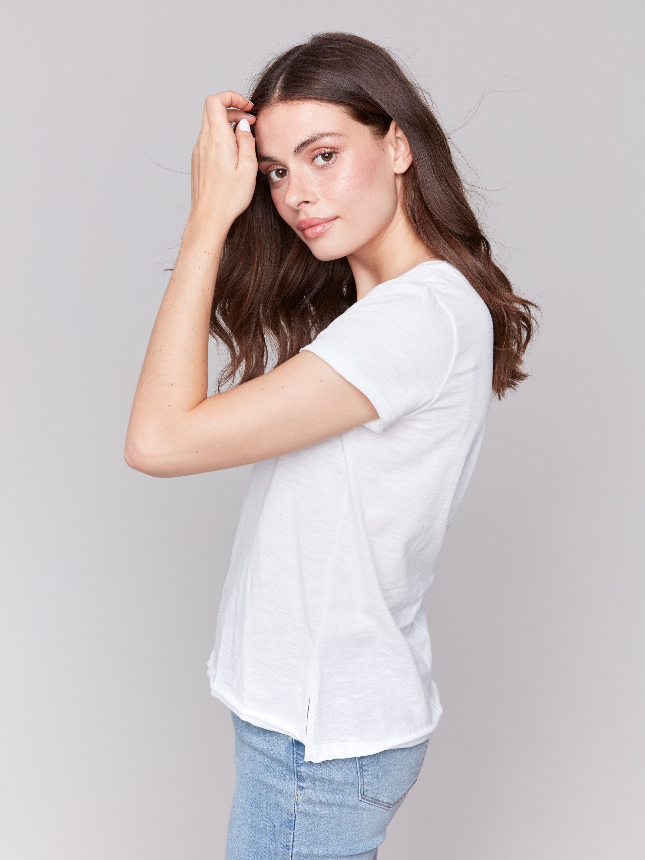Short-sleeve cotton tee with a unique front seam, by Charlie B.