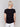 Tee highlighting its unique front seam design, by Charlie B.