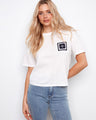 White t-shirt crafted from 100% cotton, featuring a stylish crochet pocket on the chest by Charlie B.