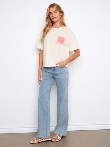 Crafted from 100% cotton, this top provides comfort and breathability for everyday wear by Charlie B.