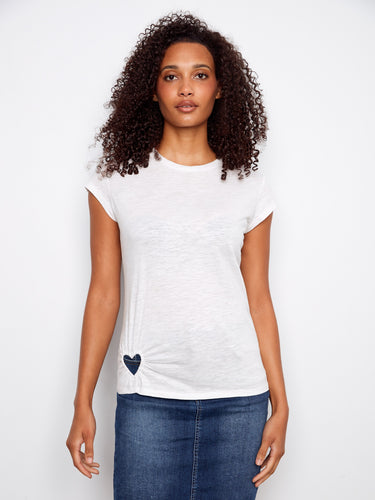 Crafted from 100% cotton, this top ensures breathability and softness against your skin. A creation by Charlie B.
