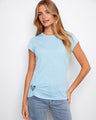 Light blue t-shirt featuring a classic crew neckline and short sleeves, crafted from 100% cotton for comfort. By Charlie B.