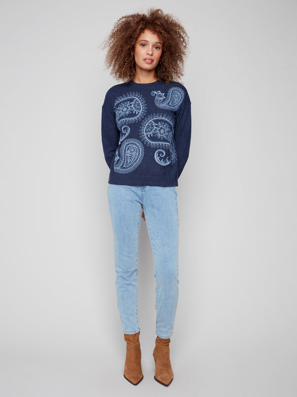 Stylish heather denim sweater with crew neck and elegant paisley details by Charlie B.