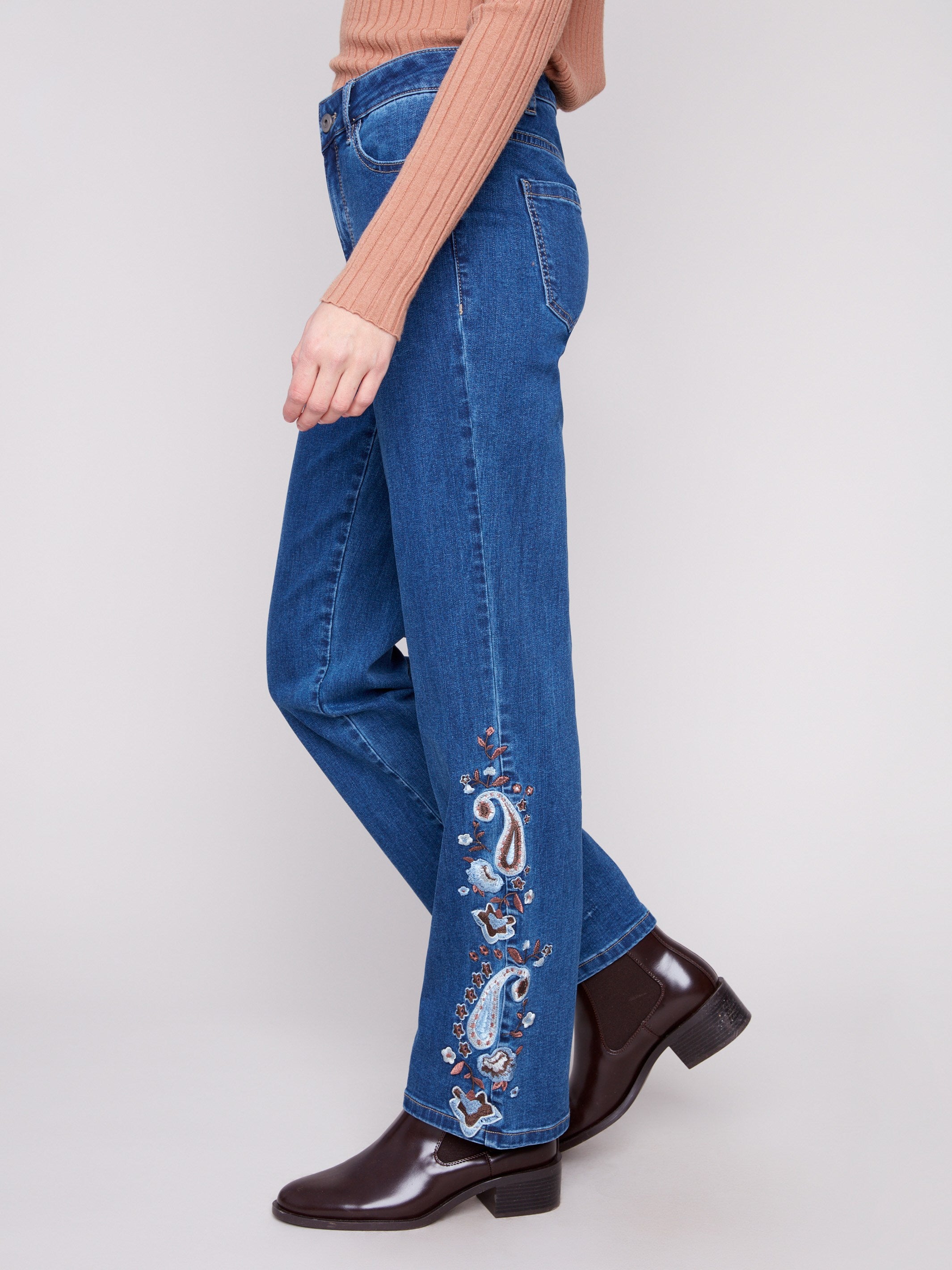 Indigo jeans with paisley embroidery, straight leg, and regular rise by Charlie B.