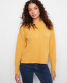 This sweater features a classic crew neck design, offering a timeless look for any wardrobe. By Charlie B.