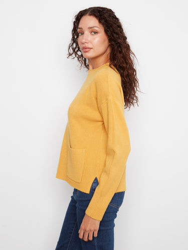 A convenient patch pocket enhances the practicality and style of this cozy sweater. By Charlie B.