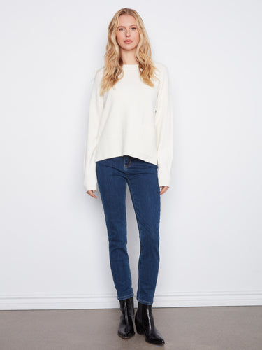 Enjoy the convenience of a patch pocket on this elegant sweater, ideal for keeping small essentials handy. By Charlie B.
