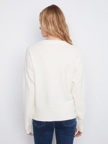 The relaxed fit with drop shoulders provides a laid-back yet chic style in this versatile sweater. By Charlie B.
