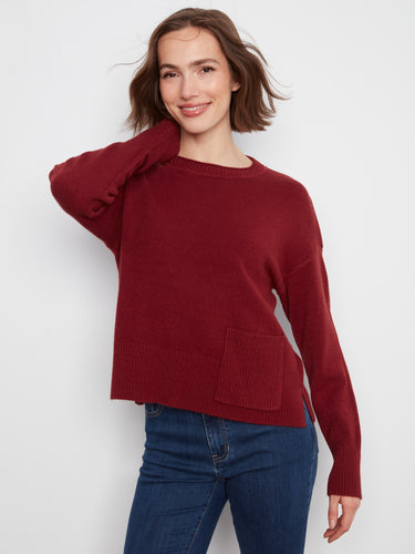 Stylish sweater with convenient patch pocket detailing, offering both fashion and functionality. Designed by Charlie B.