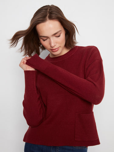 Chic sweater showcasing drop shoulders for a relaxed silhouette, ideal for effortless style. Made by Charlie B.