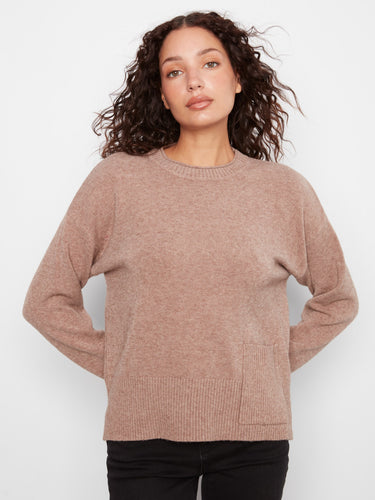 Designed with drop shoulders, this sweater offers a relaxed fit that complements any casual wardrobe effortlessly. Created by Charlie B.