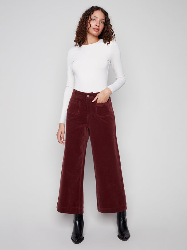 Cabernet corduroy pants with a chic flare leg and stylish patch pockets, perfect for a trendy look by Charlie B.