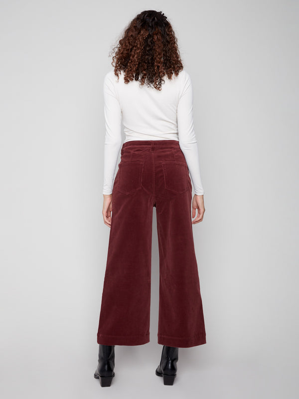 The regular rise of these cabernet corduroy flare pants ensures a flattering fit that complements any wardrobe by Charlie B.