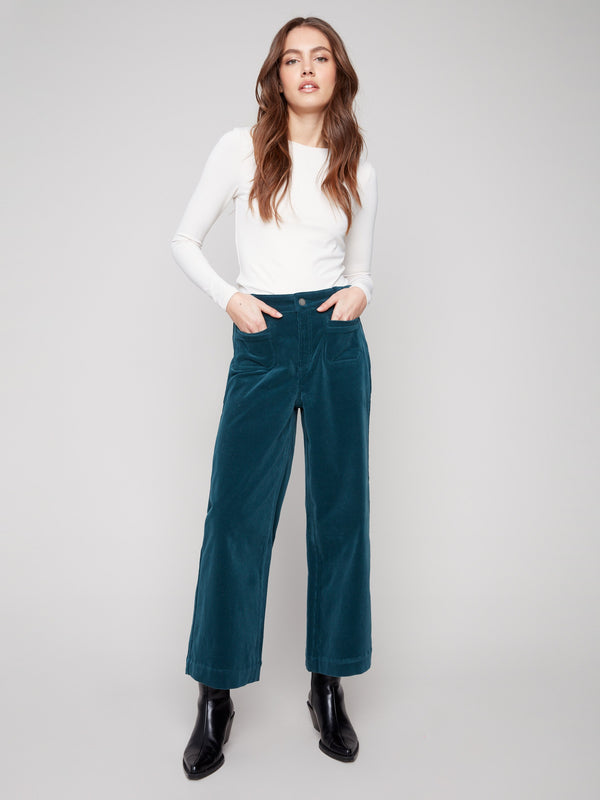 Evergreen corduroy pants with a stylish flare leg design, adding a touch of retro charm to your wardrobe by Charlie B.
