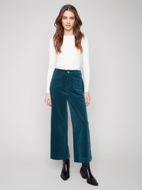 Designed with two front patch pockets, these pants combine practicality with style effortlessly by Charlie B.