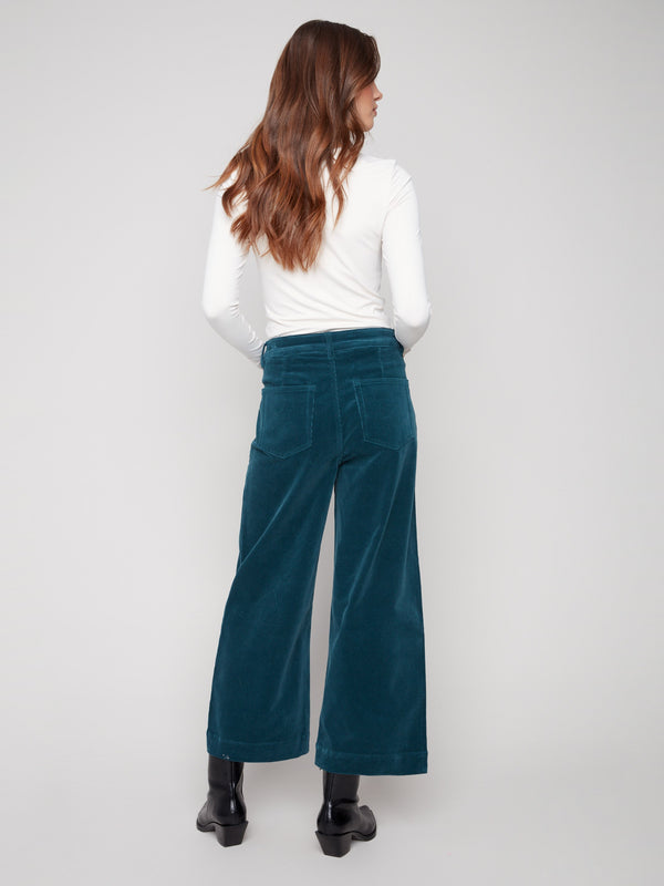 Regular rise corduroy flare pants in evergreen, offering a flattering fit that's both modern and timeless by Charlie B.