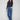 Medium blue jeans featuring a stylish flare leg and patch pockets, crafted in stretch denim for comfort by Charlie B.
