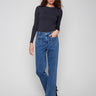 Medium blue jeans featuring a stylish flare leg and patch pockets, crafted in stretch denim for comfort by Charlie B.