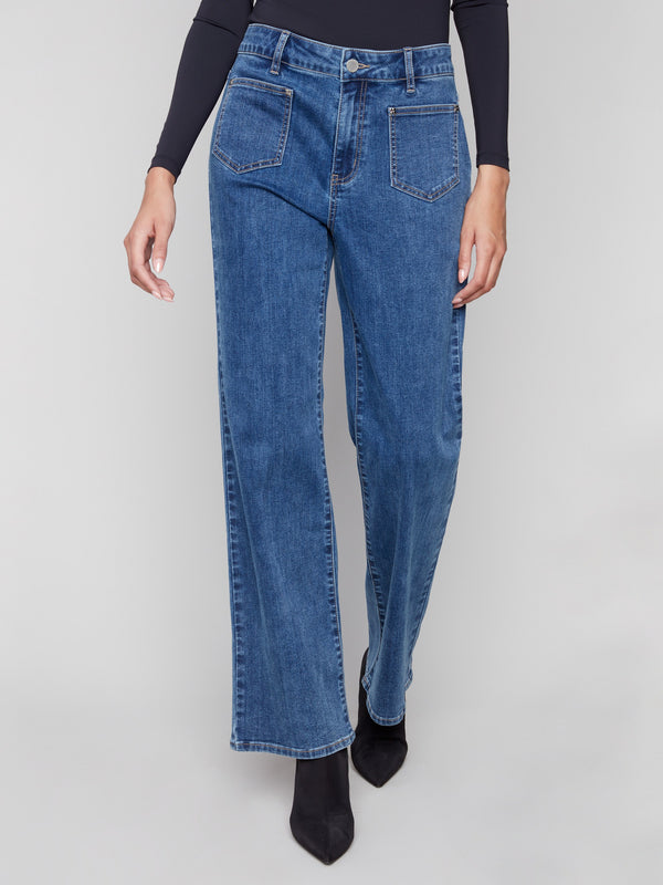 Medium blue flare jeans designed with a regular rise for a comfortable fit. Crafted from premium stretch denim by Charlie B.