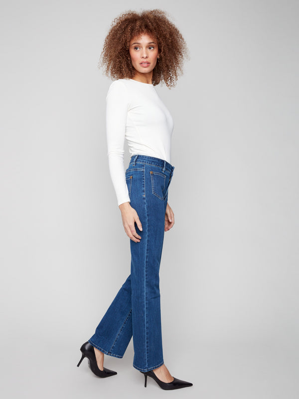 Featuring a regular rise, these indigo jeans provide a flattering fit with special rivets adding unique detail by Charlie B.